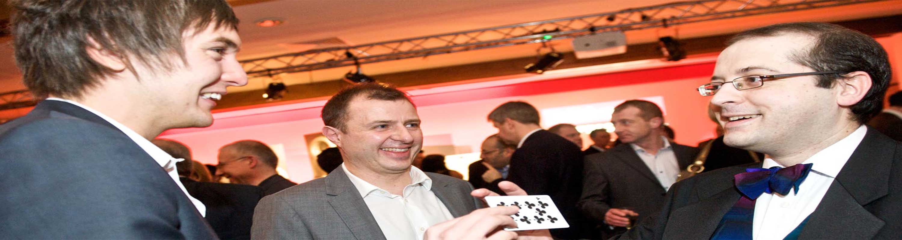 Marco performing card magic at a company event.skilled magician to enhance party